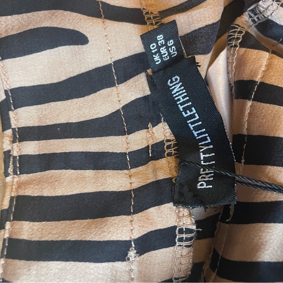 PrettyLittleThing High Waisted Wide Leg Zebra Print Pants - Picture 6 of 7